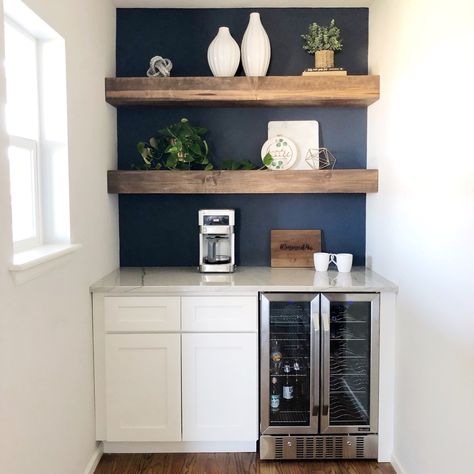 Modern coffee bar, floating shelves, wine bar, navy wall Wall Indent, Navy Kitchen Walls, Kitchen Beverage Center, Bar With Floating Shelves, Coin Café, Home Wet Bar, Home Bar Design, Coffee Bar Home, Front Rooms