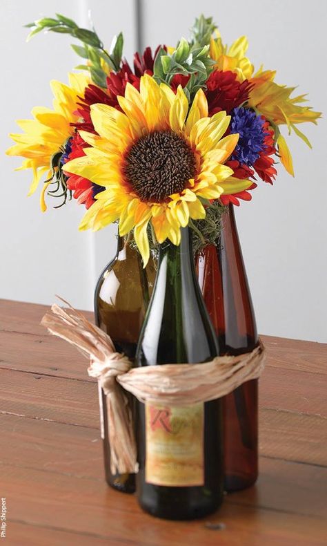 Perfect wine sunflower vase Wine Bottle Centerpiece, Wine Bottle Centerpieces, 50th Birthday Party Decorations, Bottle Centerpieces, 50th Birthday Decorations, Tafel Decor, Wine Tasting Party, Wine Craft, Wine Bottle Art