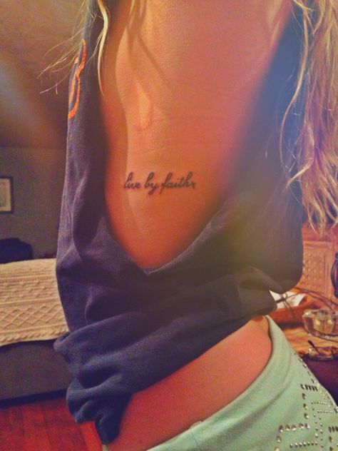 Live by faith tattoo- First tattoo idea? By Faith Tattoo, Faith Over Fear Tattoo, Faith Tattoo Designs, Fear Tattoo, Side Tattoos Women, Tattoos On Side Ribs, Tattoo Over Scar, Tiny Wrist Tattoos, Faith Tattoo