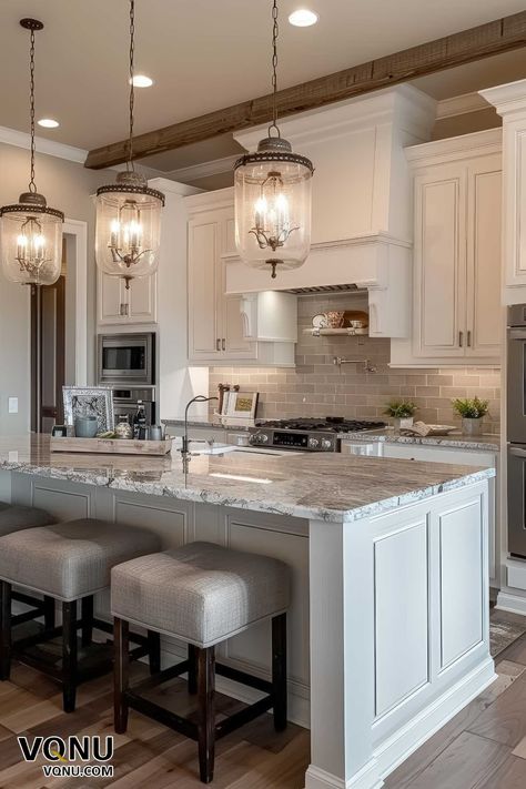 An elegant traditional kitchen with beautiful pendant lighting, classic white cabinetry, and a stunning marble island, blending timeless design with modern functionality. Contemporary Classic Kitchen, Contemporary Kitchen Design Luxury, Luxury White Kitchen, Modern Kitchen Accessories, Rustic Modern Kitchen, Modern Kitchen Island, Dream Kitchens Design, Best Kitchen Designs, White Kitchen Design