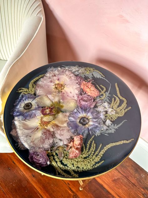 Transform your space with this striking floral resin table by Lush Magnolia! 🌺✨ Featuring a bold black backing, this piece makes the vibrant colors of preserved florals truly pop, creating a visual feast for the eyes. Combining luxury and functionality, our furniture pieces are crafted to be both beautiful and practical. Elevate your home decor with a unique resin table that highlights the natural beauty of flowers. Resin Table Flowers, Epoxy Resin Table Coffee Tables, Flipped Furniture, Coffee Table Flowers, Flower Furniture, Resin Tables, Floral Resin, Beauty Of Flowers, Tulip Table