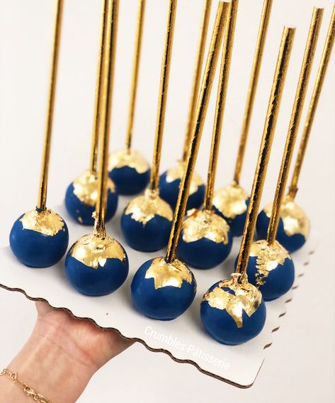 Blue and gold theme cake pops Blue Gold Theme Party, Blue Gold Dessert Table, Blue And Gold Themed Party, Navy And Gold Cake Pops, 18th Birthday Cake Blue And Gold, Cake Pops Blue And Gold, Blue Black Gold Party Decorations, Blue White And Gold Cupcakes, Navy And Gold Dessert Table