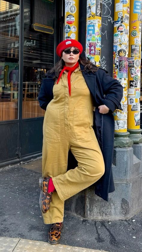 Boilersuit Outfit Winter, Jumpsuit And Loafers Outfit, Boilersuit Styling, Plus Size Outfit For Winter, Yellow Raincoat Outfit Aesthetic, Queer Christmas Outfit, Winter Eclectic Outfit, Eclectic Grandpa Plus Size, Maximalist Layering Outfit