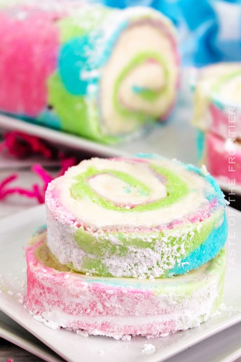 Delicious Spring Roll Cake is made with a swirl of pastel colors and filled with cream cheese frosting. It's perfect for the spring holidays. Easter Cake Roll, Lemon Cobbler, Easter Fudge, Rolo Brownies, Breakfast Bundt, Red Velvet Cake Roll, Dunkaroo Dip, Dorito Taco, Jelly Roll Cake