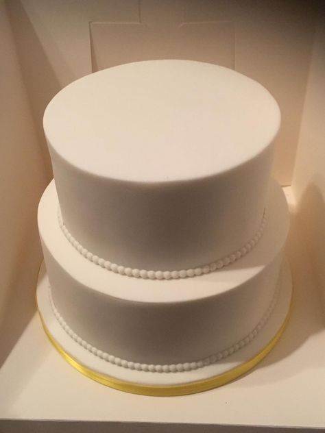 Plain white 2 tier cake by Shani's yummy cakes Plain Two Tier Cake, Plain 2 Tier Wedding Cake, White Cake 2 Tier, Plain Wedding Cakes Simple, Plain White Cake Simple, Plain Cake Design, White 2 Tier Cake, One Layer Wedding Cake, White Round Cake