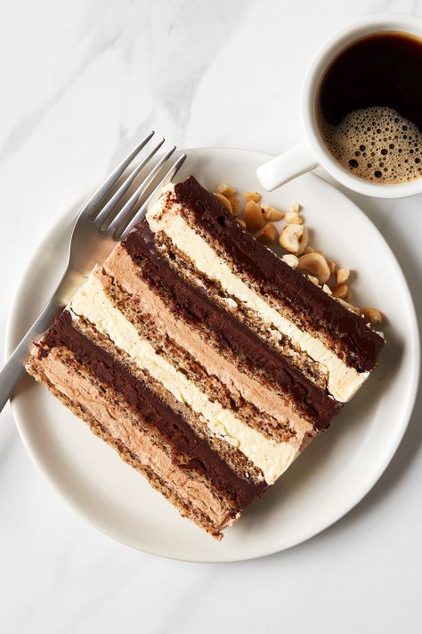 The marjolaine cake may not get quite as much attention as the Opera or Mille-Feuille, but ask any chef who is well-versed in classical French cuisine and it’s likely they’ll start going on and on about how delicious this layered dessert is. This recipe has three main parts: the cake, the buttercreams, and the ganache. It might seem intimidating at first but if you break it into parts, it is very manageable. Most Popular Dessert Recipes, Nutella Buttercream, Popular Dessert, French Cake, A Piece Of Cake, Cake Tasting, Piece Of Cake, Perfect Cake, Chocolate Ganache