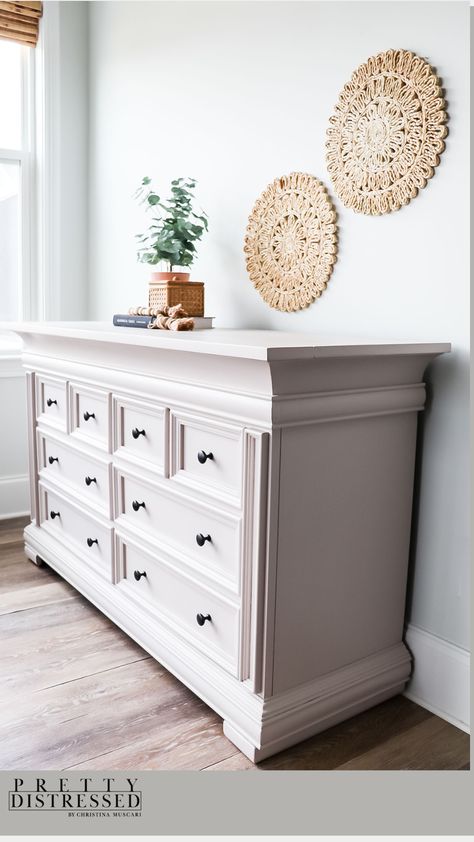 I used Beyond Paint's All in One Paint in the color Sand to makeover this dresser in one day. This paint primes, paints, and seals in one step and is a great choice for a furniture painting beginner. This piece was transformed from a dated piece of furniture to a beautiful piece of DIY home decor. Colors To Paint Dressers, Off White Furniture Paint, White Painted Dresser, Cream Colored Painted Furniture, White Furniture Paint, Cream Colored Dresser, Beige Painted Bedroom Furniture, Painting Bedroom Furniture White, Beyond Paint Colors