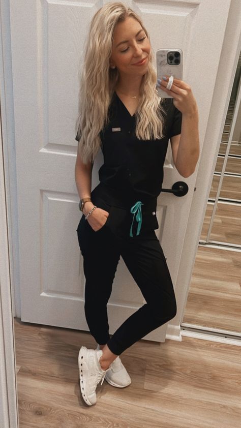 Cute Scrubs For Women, Black Nurse Scrubs Outfits, Teal Scrubs Nursing, Black Jogger Scrubs Outfit, Vet Tech Scrubs For Women, Scrubs Tucked In, Black Scrubs Uniform For Women, Navy Blue Scrubs Outfit With Shoes, Vet Scrubs Uniform