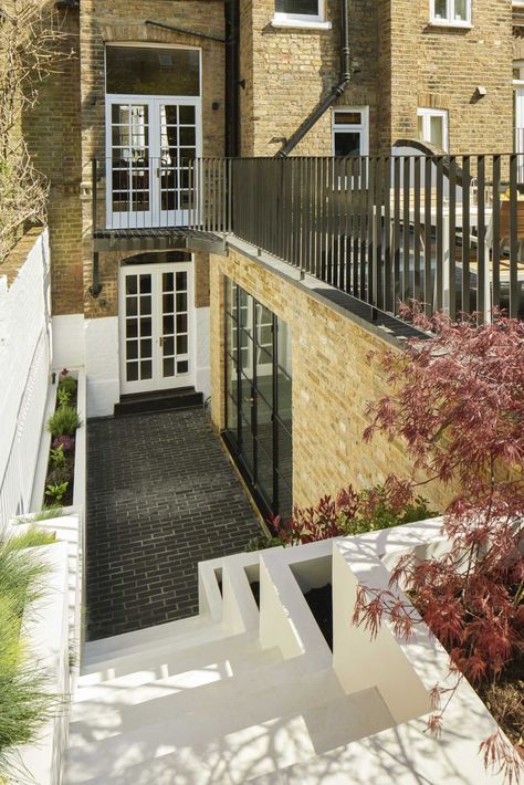 Stairs With Built-In Planters Lead To The Back Garden At This Home Basement Conversion, House Extension Plans, Property Developer, Knightsbridge London, British Architecture, London Townhouse, Creative Architecture, Basement House, House Extension Design