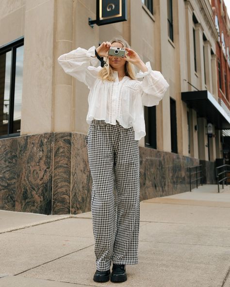 Fall is for the Retro Aesthetic Lovers 🖤 This blouse and checkered pants, are the perfect combo to exude vintage charm ✨ #boutiqueshopping #boutiquefashion #midwestfashion #fashion #fallfashion #shopsmall #localboutique #clothingboutique #illinoisboutique #effingham #shopRTB #midwestfashion #illinoisfashion #pinterestgirl #clothinginspo #fashioninspo #vintagefashion #fallootd #falloutfitinspo #checkeredpants Gingham Pants Outfit, Aesthetic Lovers, Ruffle Shoulder Top, Gingham Pants, Checkered Pants, Fall Fits, Running Tops, Pinterest Girls, Outfit Inspo Fall