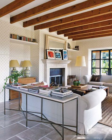 A mix of Mallorcan traditional and modernity in a house in Tramuntana Joist Ceiling, Basement Suite Ideas, Attic Master Suite, Mediterranean Style Living Room, Exposed Ceiling, Exposed Ceilings, Basement Furniture, Kitchen Ceiling, Barn Lighting