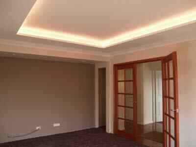 strip lighting in bulk head lounge ceiling Bulk Head Ceiling, Bulkhead Ceiling, Ceiling Cladding, Timber Ceiling, House Ceiling Design, Timber Panelling, Ceiling Light Design, Bedroom Ceiling, False Ceiling Design