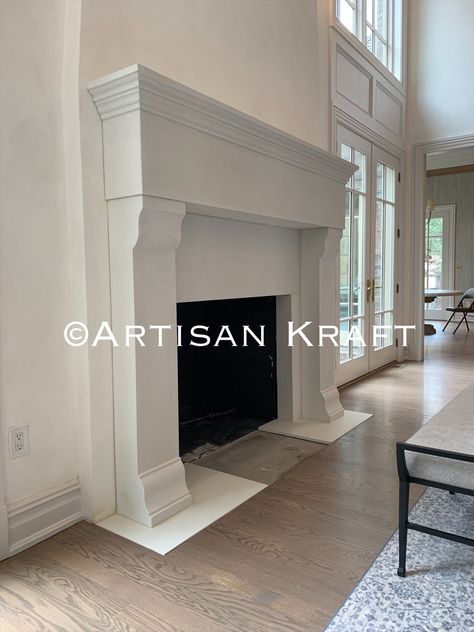 Cast stone transitional fireplace mantel surround. Pictured in a traditional living room. This is a fireplace remodel in a home renovation. Precast Fireplace, Prefab Fireplace, Mantel Makeover, Fireplace Mantel Surround, Limestone Mantel, Fireplace Feature Wall, Cast Stone Fireplace, Simple Fireplace, Stacked Stone Fireplaces