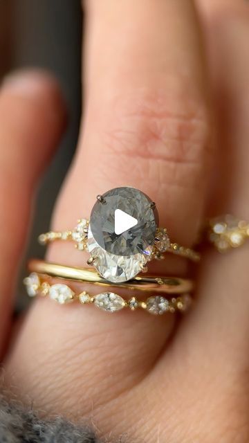 Melanie Casey Fine Jewelry on Instagram: "ENSEMBLE RING  A 3ct. oval cut diamond is set in our clustery diamond cathedral Ensembles setting, styled with our signature Interwoven Band and 2mm Pairing Band.

#ovaldiamondring #diamondring #melaniecaseyjewelry" Melanie Casey, Oval Diamond Ring, Oval Cut Diamond, Oval Cut, My Jewellery, Diamond Ring, Fine Jewelry, Engagement Rings, Band