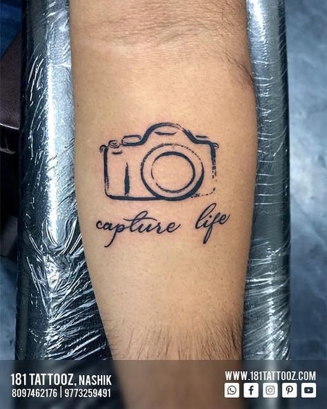 Camera is the first love of every Photographer. And as the quote truely says "Capture life", he does the same.. Relate to your profession with a tattoo and strengthen your goals towards it... For such Profession related tattoos visit @181_tattooz_studio Photographer Tattoo Ideas, Camera Tattoo Ideas, Tattoo Ideas Minimal, Photography Tattoos, Photographer Tattoo, Related Tattoos, Camera Tattoos, Photography Tattoo, Camera Tattoo