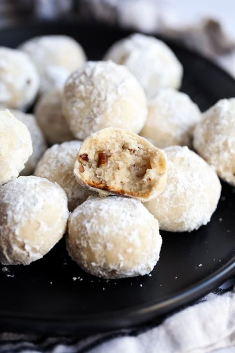 Russian tea cakes (also called snowball cookies) are rich and buttery holiday cookies coated in powdered sugar, filled with walnuts or pecans! Russian Tea Cookies Easy, Russia Tea Cakes, Russia Tea Cookies, Best Russian Tea Cakes Recipe, Snowball Walnut Cookies, Swedish Tea Cookies, Russian Cookies Christmas, Russian Teacakes Cookies, Russian Tea Cookies Recipe