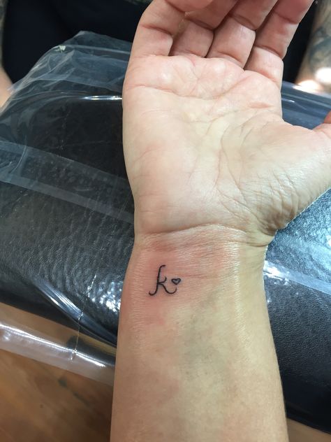 My tiny initial wrist tattoo 💕 Small K Initial Tattoo, Tiny Wrist Initial Tattoos, Cute K Tattoos, Men Initial Tattoo, T Initals Tattoo, The Letter K Tattoo, Cursive Initial Tattoo On Wrist, Initial On Wrist Tattoo, Initial Tattoo On Wrist For Women