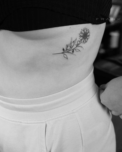 Sunflower tattooed under the breast. Below Breast Tattoo, Under Breast Tattoo Women, Tattoos For Women Underboob, Underboob Tattoo Flower, Sunflower Rib Tattoo, Underboob Flower Tattoo, Tattoo Inbetween Breast, Under Breast Tattoos For Women, Tattoo Ideas Underboob