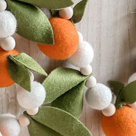 Katie | Crafter and Felt Enthusiast on Instagram: "I don’t know about you, but I am definitely ready for warmer weather! These fruity garlands are perfect for adding color into your decor this spring/summer. Some of my favorite ways I would decorate with these garlands are: •Hang from a mantle or shelf •Use as a runner and part of your table decor •Hang on a mirror or picture frame •Draped safely in a nursery Where would you decorate this orange or lemon garland?!?" Lemon Garland, Christmas Felt, Felt Garland, A Mirror, I Don T Know, Be Perfect, Table Decor, Picture Frame, Picture Frames