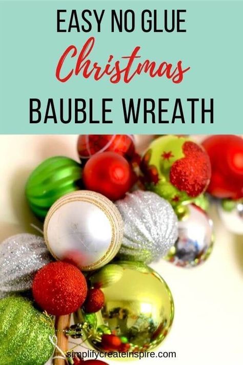 "The easiest DIY bauble wreath - no glue needed! Plus plenty of inspiration of gorgeous DIY Christmas wreaths you can make at home. Make your own Christmas decorations with these simple wreath tutorials at home. DIY ball wreath with a hoop is the perfect way to make a massive Christmas wreath without spending a fortune! " How To Make A Bauble Wreath, Ball Ornament Wreath, Alternative Wreath Ideas, Diy Bauble Wreath, How To Make An Ornament Wreath, Diy Ball Wreath, Bauble Wreath Diy, Christmas Ball Wreath Diy, Double Door Wreath Ideas