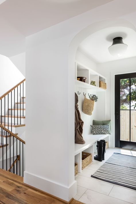 Mudroom Design | Mudroom Inspiration | Arch | Arched Doorway | Storage | Storage Solutions | Organizing | Entry | Tile | Home Design | Accessories | Interior Design | Inspiration | Inspo | Decor | Styling | Hannah Charlotte Interiors Arch Entryway Interior, Doorway Storage, Mudroom Inspiration, Arched Entryway, Foyer Cabinet, Arch Entryway, Arched Doorway, Entry Tile, Mudroom Entryway