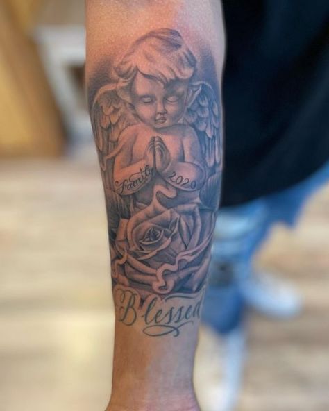 Luis Martinez on Instagram: "Angel and Rose done today on @v_chris707 🤙🏽 #angeltattoo#rosetattoo#tattoos#blackngreytattoos#mendo#ukiah#pryse#outlawtattoos" Angel With Name Tattoo, Baddie Angel Tattoo, Angel With Roses Tattoo, Rose Angel Tattoo, Angel And Rose Tattoo, Angel Rose Tattoo, Luis Martinez, Baby Angel Tattoo, Rosé Angel