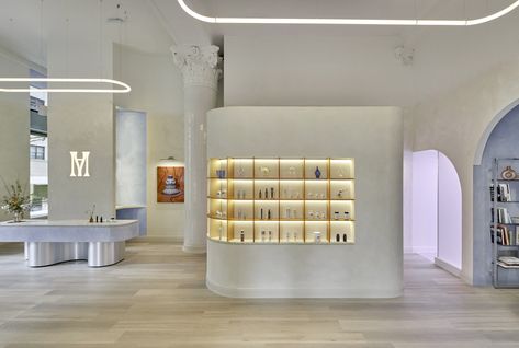 Modern Age Flagship in NYC by Madelynn Ringo | Yellowtrace Boston Interiors, Wellness Clinic, Good Readers, Clinic Design, Modern Shelving, Terracotta Tiles, Curved Glass, Felt Material, Commercial Space