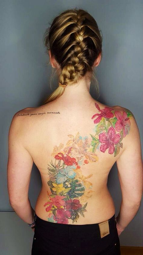 Women flower back tattoo, hawaii, surfing tattoo. Hawaiian Flower Spine Tattoo, Back Tattoo Women Full Flowers, Hawaiian Back Tattoos For Women, Japanese Flower Back Tattoo, Back Tattoo Women Hawaiian, Back Tattoo Women Full, Side Back Tattoos, Colorful Flower Tattoo, Floral Back Tattoos