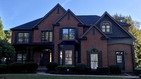 Dark Gray And Red Brick House Exterior, Dark Red Brick House Exterior Colors, Brick House With Dark Siding, Black And Red House Exterior, Dark Brick Homes Exterior, Red Brick House With Black Accents, Maroon Brick House Exterior, House Paint With Red Brick, Red Brick Black Siding