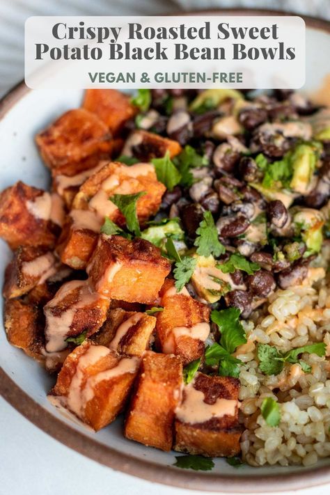 This Crispy Roasted Sweet Potato Black Bean Bowl is an easy dinner ready in 30 minutes. The crispy coated sweet potatoes roast easily in the oven and are served with a chili oil black bean salad. Black Bean And Broccoli, Black Beans Dinner Ideas, Sweet Potato Recipes Black Bean, Black Bean Veggie Bowl, Rice Bowls Sweet Potato, Black Beans Bowl, Sweet Potato Black Beans Recipes, Baked Sweet Potato With Black Beans, Black Bean Bowl Healthy