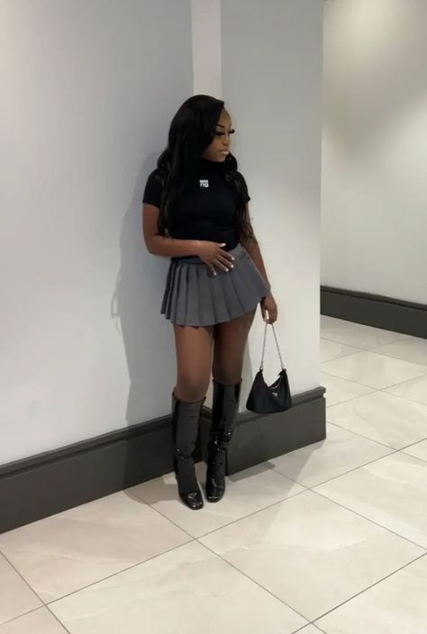 Grey Mini Skirt Outfit Black Women, Calm Birthday Outfits Winter, Bad And Boujee Aesthetic Outfit, Mini Tennis Skirt Outfit Black Women, Poses Skirt Outfit, Pleated Skirt Outfit Baddie, Skirt Bday Outfit, Corset With Skirt Outfits Black Women, Knee Boots Outfit Black Women