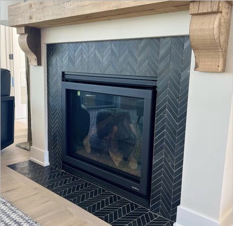 Fireplace Black Herringbone Tile, Matte Black Chevron Tile Fireplace, Matte Black Fireplace Tile, Black Chevron Tile Fireplace, White Fireplace Black Tile, Dark Tiled Fireplace, Black And White Tiles Fireplace, Black Tiles Fireplace, Fireplace Tile Surround Mid Century