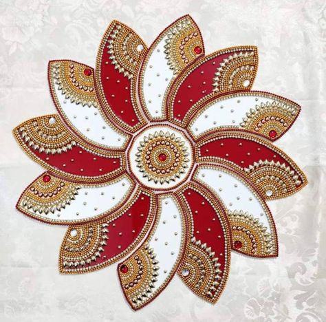 Once you place the order, we will reach out to check which two Rangoli you would like to pick. Pre-made floor Rangoli that gives an authentic Indian touch to your home decor. It can also be used as a wall art. Handcrafted on a base that is made out of acrylic. Each of these are decorated with beads, artificial diamonds and handcrafted artwork. It can be used for indoor or outdoor home decor. Ideal for house warming, birthday and wedding gifts. Candles are not included along with the product. Artificial Rangoli Designs, Lakshmi Poojan Rangoli Designs, Diwali Padwa Rangoli Design, Diwali Padwa Rangoli, Kundan Rangoli Designs, Aari Drawing, Hanging Decorations Diy, Lipan Art, Tassels Designs