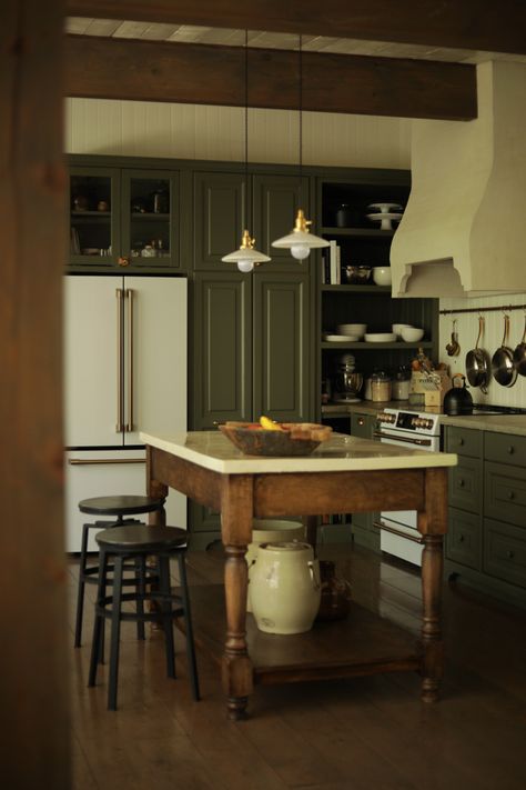 Green kitchen cabinets Oak Kitchen Green Walls, Green Brown Kitchen Cabinets, Green Cabinets Dark Floor, Green Cottage Kitchen Cabinets, Green Kitchen Wood Cabinets, Dark Olive Kitchen Cabinets, Dark Green Kitchen Cabinets, Moody Cottage, Paint Your Cabinets