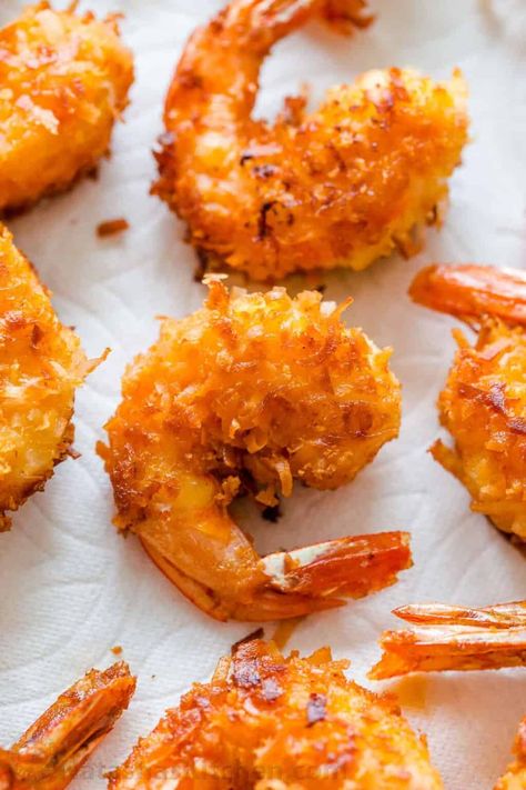 Coconut Shrimp are crisp on the outside with succulent juicy shrimp inside. Do not skip the 2 ingredient coconut shrimp sauce and squeeze of lime juice. #coconutshrimp #shrimprecipes #coconutshrimprecipe #coconutshrimpsauce #coconutshrimpdippingsauce #shrimp #appetizer #natashaskitchen Coconut Shrimp Dipping Sauce, Coconut Shrimp Sauce, Crabby Patty, Low Carb Shrimp, Shrimp Dipping Sauce, Sweet Chili Dipping Sauce, Easy Dipping Sauce, Dinner Seafood, Shrimp Appetizer