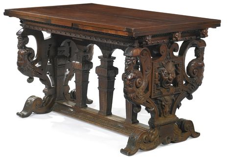 This Italian Renaissance table was carved from walnut wood. It is known as a table a l'Italienne refectory table as it was first used in the refectory of monasteries. It features highly decorative single slab legs on either side of the table, and is supported by a perpendicular floor stretcher. Bauhaus Furniture Design, Draw Leaf Table, Bauhaus Furniture, Gothic Furniture, European Furniture, Gothic Decor, Gothic Home Decor, Italian Furniture, Furniture Styles