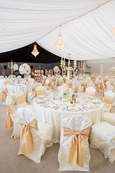 White And Gold Table Setting Wedding, Gold And Cream Wedding, Cream White And Gold Wedding Decor, Champagne Table Cloths Wedding, Beige Satin Tablecloth Wedding, Gold Satin Tablecloth Wedding, Gold Chair Covers, White Chair Covers With Gold Sash, White And Gold Wedding Themes