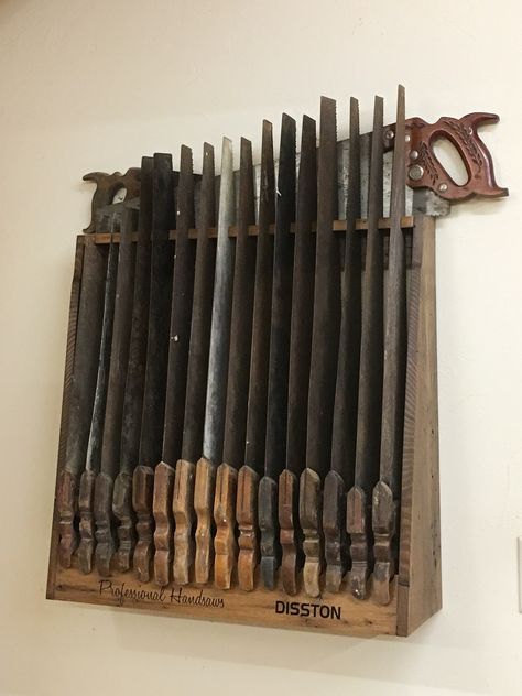 Disston hand saw display made from chestnut reclaimed wood Hand Saw Storage Ideas, Hand Saw Storage, Old Hand Saw Ideas Projects, Woodshop Tools, Woodworking Tool Cabinet, Tool Storage Cabinets, Vintage Hand Tools, Garage Furniture, Woodworking Saws