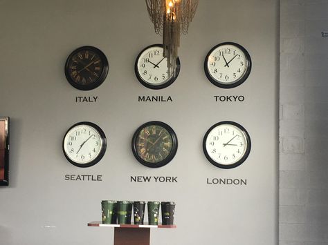 My local coffee shop has clocks for a bunch of different time zones. Tourism Company Interior Design, World Clock Wall Ideas, Cute Wall Decor Ideas, Time Zone Clocks Decor, Time Zone Clock Wall, Clocks With Different Time Zones Display, Wall Clock Time Zones, Wall With Clock, Timezone Clocks Display