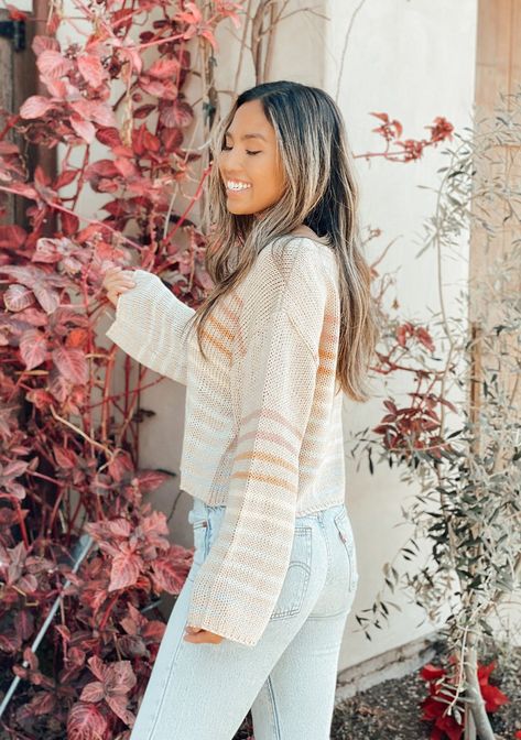 Add some color to your wardrobe with our multi-colored striped sweater! This fun and flirty pullover features long bell sleeves, an elegant boat neckline, and an easy cropped length. The perfect layering sweater for all year round! FINAL SALE Oversized, relaxed fit Long bell sleeve Dropped shoulder Cropped length Boat neckline Model is 5'10, wearing a size S.Style: I-50452PJO Relaxed Style Outfits, Striped Knit Sweater, Long Bell Sleeves, Cropped Long Sleeve Top, Cropped Knit Sweater, Sweater Layering, Mommy Style, Color Block Sweater, Outfit Inspo Fall