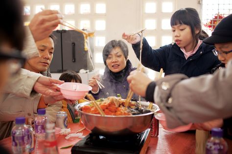 Chinese New Year in Hong Kong - Photo Gallery | SAVEUR Family At Restaurant, Chinese Family Dinner, Eating Etiquette, Food Etiquette, Dragon Scene, Noodles Vegetables, Hong Kong Travel Guide, Chinese Family, Chinese Lunar Calendar