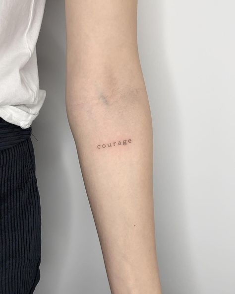 A word ‘Courage’ tattoo by Conz Thomas inked on the left forearm Courage Tattoos, Tattoo Dotwork, Omerta Tattoo, Inspiration Tattoos, Best Friend Tattoos, Dainty Tattoos, Small Tattoo Designs, Friend Tattoos, Word Tattoos