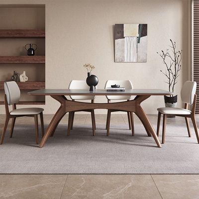 Our Modern Minimalist Solid Wood Rock-Plate Table reimagines the dining space with its artistic design and unmatched durability. A comfortable and stylish addition to any dining room. Orren Ellis Size: 29.5"H x 55.1"L x 31.4"W, Table Top Color: Gray | Orren Ellis Rayquann Rectangular Dining Set brownWood in Gray | 29.5"H x 55.1"L x 31.4"W | Wayfair Modern Midcentury Dining Room, Modern Dining Table Chairs, Wayfair Dining Table Set, Minimalist Dining Area, Dining Table Minimalist, Modern Minimalist Dining Room, Midcentury Dining Room, Minimalist Dining Table, Dining Table Design Modern