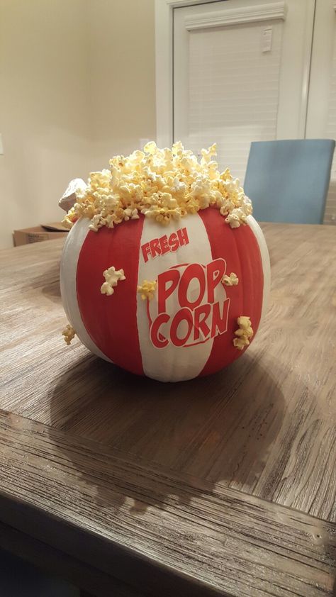 painted pumpkin, popcorn bucket pumpkin. paint is from home depot (red:flirt alert, white: ultra pure white) popcorn glued on with hot glue gun, letters cut out of popcorn bags from dollar store. Creative Pumpkin Painting Ideas, Popcorn Pumpkin, Cute Painted Pumpkin Ideas, Fall Pumpkins Painting, Popcorn Theme, Pumpkin Decorating Diy, Funny Airport Signs, Creative Pumpkin Painting, Creative Pumpkin Decorating