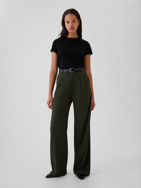 Soft woven trousers.  E-waist with concealed hook and bar closure, zip fly.  Front slant pockets, back welt pockets.  Pleating at front.  * Fit: Classic.  An easy silhouette that fits close  at the waist, and is relaxed through the hips and thigh.  Models wearing Gap Massage Therapist Outfits For Women, Green Flowy Pants Outfit, Women’s Work Wear, Tomboy Wedding Outfit Guest, Dark Green Trousers Outfit, Medical Professional Outfits, Office Outfits Women Curvy, Casual Business Attire For Women, Green Trousers Outfit