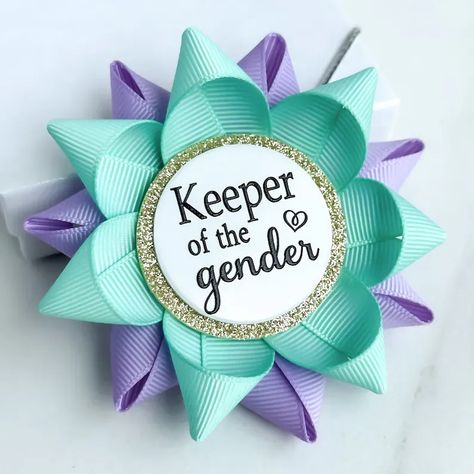 Planning a purple and teal gender reveal party? Celebrate with this keepsake Keeper of the Gender pin! Each flower is handmade with grosgrain ribbon, shown in Aqua and Lavender with Light Gold sparkle. It features a custom printed centerpiece and your choice of glitter detail color, with a bar pin backing. No need to purchase gift wrapping for these, as they are each packaged in a cotton lined gift box with bow Purple And Teal Gender Reveal, Purple And Blue Gender Reveal Ideas, Purple And Green Gender Reveal, Mint Ideas, Aqua And Lavender, Keeper Of The Gender, Baby Shower Pin, Gender Reveal Themes, Green Baby Shower