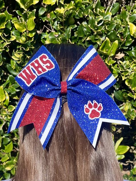 Elevate your cheer game with this dazzling 7" x 7" glitter cheer bow!  🎀Crafted with 3" wide grosgrain and fully covered in glitter heat transfer vinyl, these bows are not only stylish but also customizable with your team logos. 🎀For complex logos, please send them beforehand for confirmation. Note that colors may vary slightly in person, so if you have concerns, I can provide color swatches or pictures taken in natural lighting.  🎀The bows are securely attached to Goody brand hair ties, ensu Cheer Games, Character Hair Bows, Bows Ideas, Competition Cheer, Bow Making Tutorials, Character Hair, Glitter Cheer Bow, School Breakfast, Bow Ideas