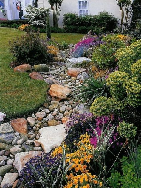 bed does not have to be so simple. If you observe water streams, you will see that Garden With Rocks, Dry River Bed, Dry Stream, River Rock Garden, Dry Creek Bed, River Rock Landscaping, Dry River, Rock Garden Design, Rock Landscaping