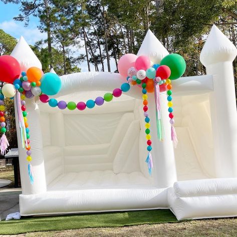 Balloon Garland On Bounce House, Bounce House Balloon Garland, Playroom Business, Birthday Bounce House, Castle Birthday Party, Party Rentals Business, Link Balloons, Bubble Dome, Bubble House