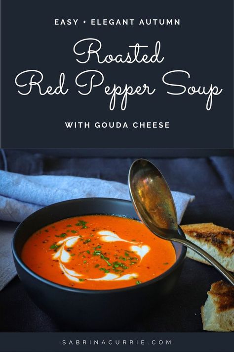 Bright red soup with swirls of cream and a sprinkle of parsley on top. Sheet Pan Roasted Red Pepper Soup With Grilled Cheese Croutons, Roasted Red Pepper And Gouda Soup, Roasted Red Pepper Gouda Soup, Roasted Red Pepper And Tomato Soup, Red Pepper And Gouda Soup, Red Pepper Gouda Soup, Jarred Peppers, Gouda Soup, Appetizer Soup